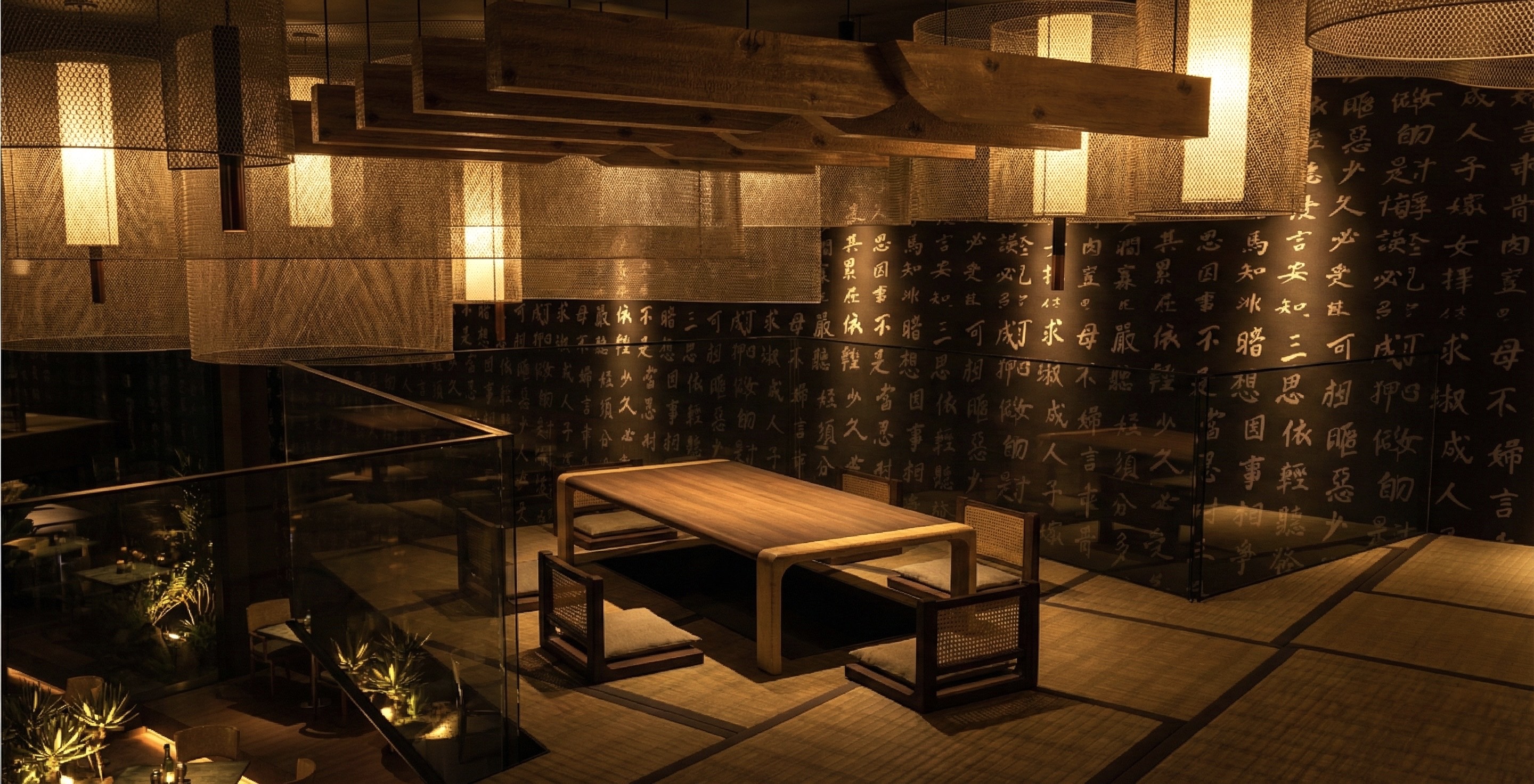 Espace repas avec calligraphies et suspensions bronze